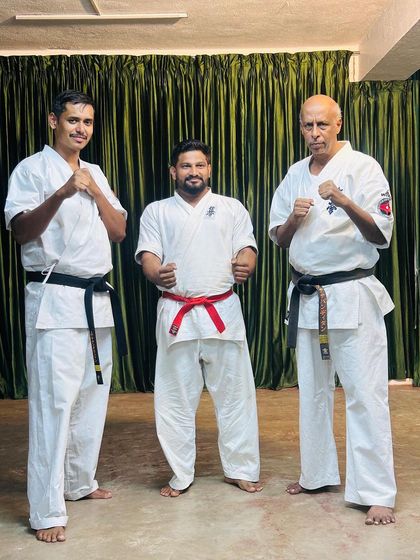 Posing with a fellow instructor and a senior master at the Ooty camp. We are all part of the larger World Kyokushin family.