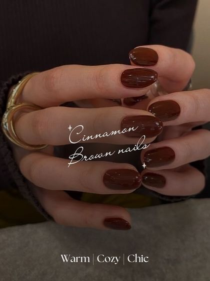 Cozy and chic, these cinnamon brown nails are perfect for a warm and inviting look. The rich, solid color is effortlessly stylish.