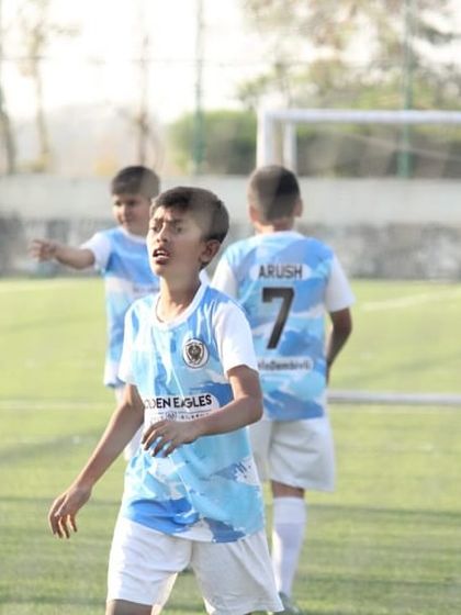 A player calls for the ball during a Blue Cubs league match. We encourage communication and awareness on the field.