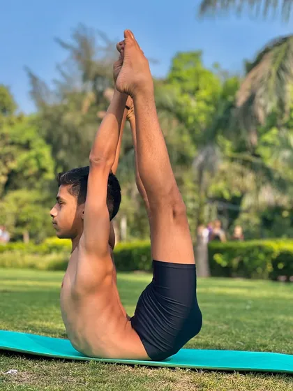 This Urdhva Prasarita Padasana variation builds incredible core strength. We practice poses like this regularly in our outdoor group classes.