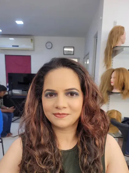 A cool-toned smokey eye using shades of grey and black. This is a classic choice for an evening event and was paired with soft waves in the hair.