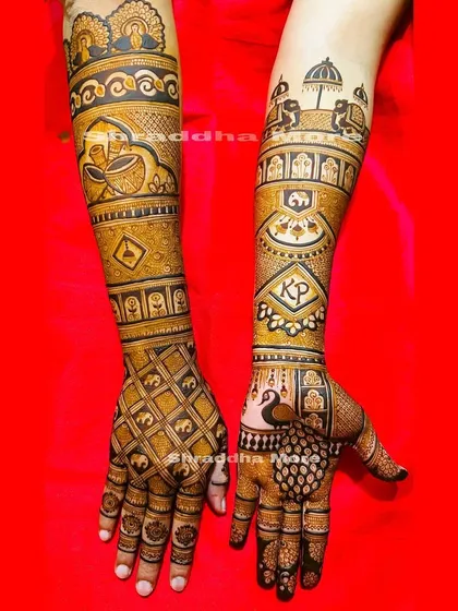 This design was personalized with the couple's initials 'KP'. It features a wedding procession with an elephant and doli, along with a diya motif for prosperity.