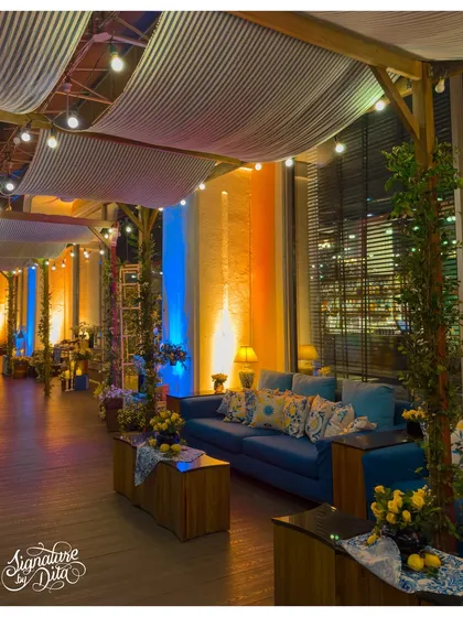For this corporate dinner, I created a sophisticated Sicilian-themed lounge. The combination of draped ceilings, warm string lights, and carefully chosen furniture transformed an indoor space into a chic Mediterranean escape, perfect for networking.