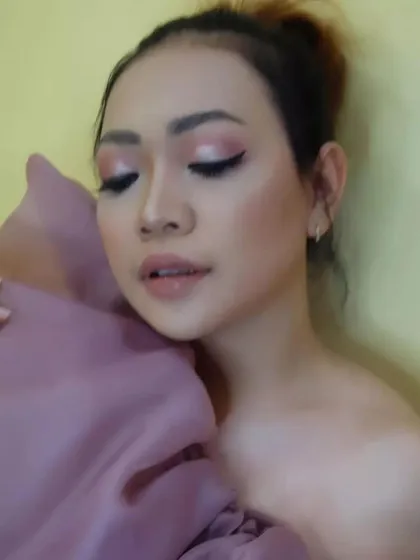 A soft and dreamy look created with makeup. The focus is on the ethereal pink eyeshadow and glowing skin, showing a different, more artistic side of my work.