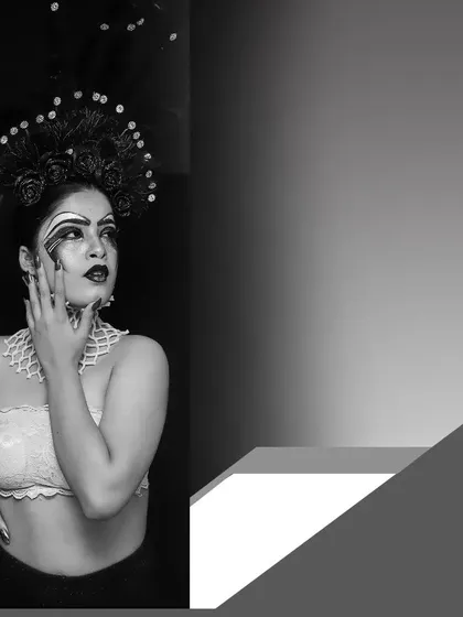 A bold, graphic-style portrait. This black and white image combines photography with geometric shapes, creating a modern and artistic piece that is perfect for an avant-garde beauty or fashion story.
