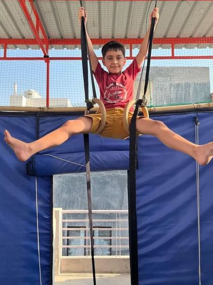 Using gymnastic rings is another way we play with the air element. This helps build serious upper body strength and is a favorite among the kids.