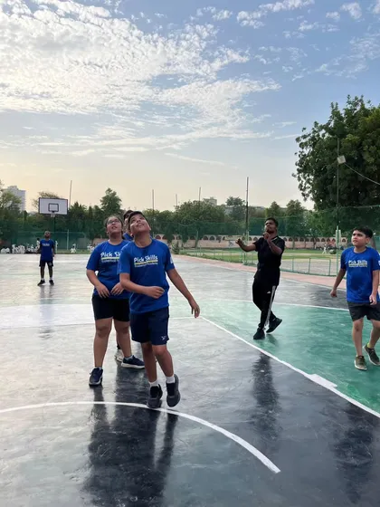 A moment from a practice game where players are reacting to a rebound. Real-game scenarios are the best way to develop game sense, build confidence, and learn to apply skills under pressure.