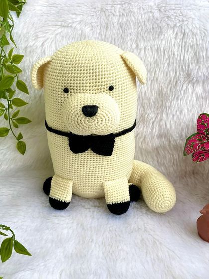 This is Bond, the fluffy dog from the anime Spy x Family. He was made to accompany the Anya doll, creating a perfect pair from the popular series.