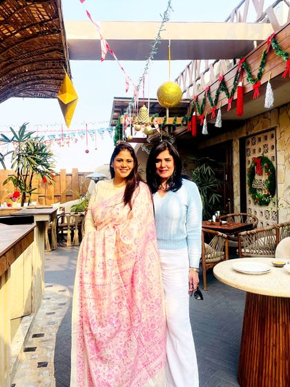 A happy moment captured with my friend Shruti. My casual outfit was perfect for a relaxed lunch, proving that you don't need to be overdressed to look chic.
