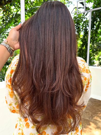 Are you even birthday ready if your hair ain’t done? This transformation involved covering significant grey regrowth and blending it into a rich, youthful brunette color with a fresh cut.