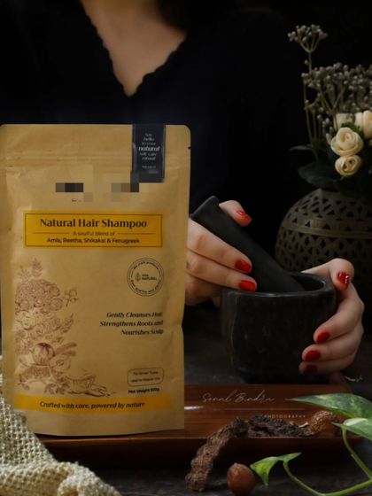 I used a dark, moody setting to capture the essence of this natural hair shampoo. The hands-on approach with a mortar and pestle highlights the traditional, Ayurvedic ingredients like Amla, Reetha, and Shikakai.