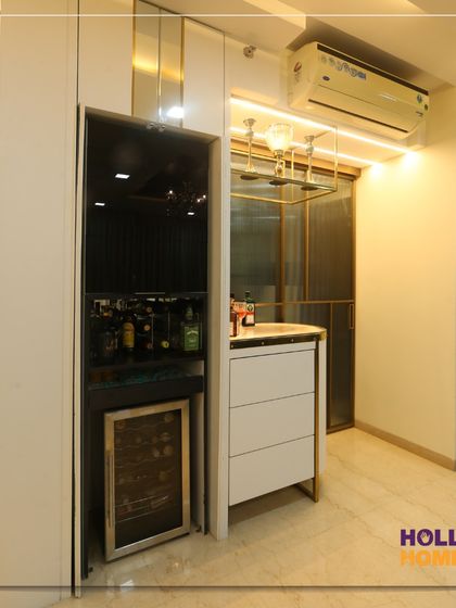 Another angle of the sleek home bar unit, showing its compact design and elegant integration into the living space.