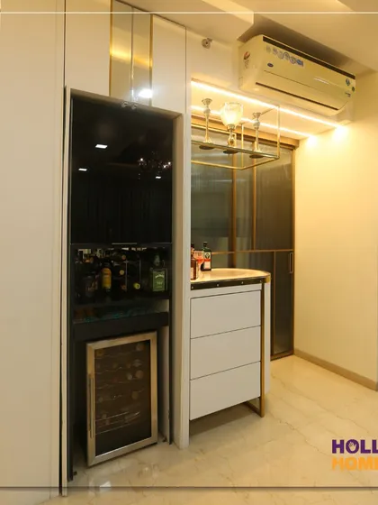 Another angle of the sleek home bar unit, showing its compact design and elegant integration into the living space.