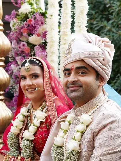 A beautiful, candid moment of the happy couple, Priyanka and Ashish, during their wedding ceremony. We believe in creating a backdrop so perfect that the couple's joy naturally becomes the centerpiece of the day.