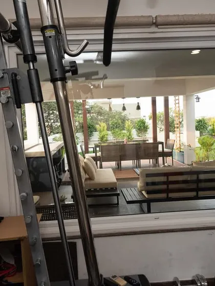 The view from inside the gym, looking out onto the beautiful terrace garden we created. Having a green view makes exercising so much more enjoyable and motivating.