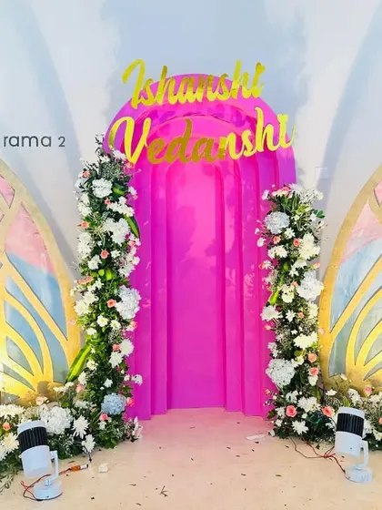 Interactive photo spots are a great addition to any event. I constructed these large, freestanding butterfly wings, decorated with florals and lit from below, to create a unique and memorable photo opportunity for guests.