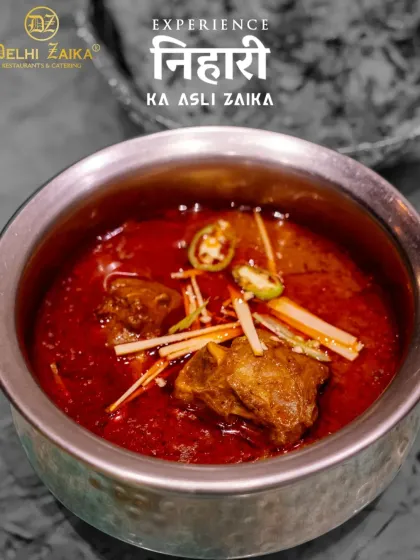 Experience the real 'zaika' of our Nihari. A deep, rich, and aromatic stew, slow-cooked to perfection and garnished with ginger and green chilies.