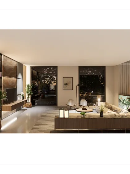 This living space at ALTURA opens up to the outdoors through large glass doors. The interior design uses a neutral palette and natural materials to maintain a strong connection with the exterior view, even at night.