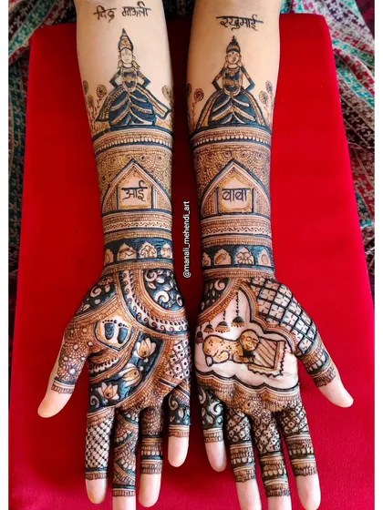 A traditional Dohale Jevan mehandi design featuring portraits of Vitthal and Rukmini, with 'Aai' and 'Baba' written on the arms. The palms show a sleeping baby and other auspicious symbols.
