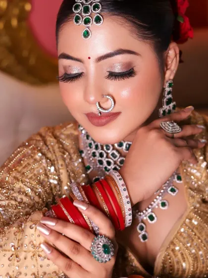 A close-up of the soft glam look, showing the subtle shimmer on the eyes and the perfectly groomed brows.