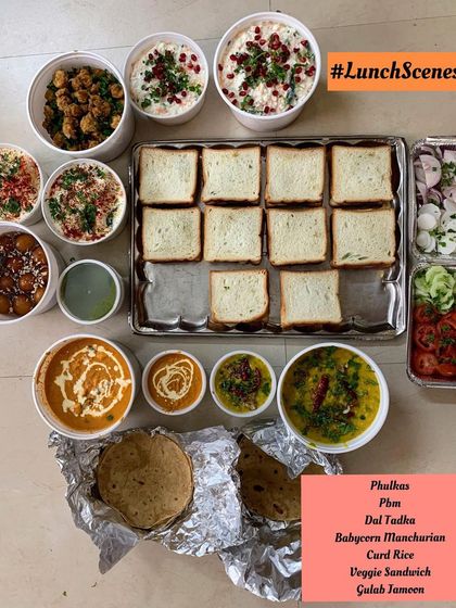 A lunch scene with Phulkas, Paneer Butter Masala, Dal Tadka, Babycorn Manchurian, and more.