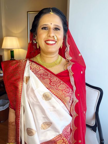 A smiling portrait of the bride. My goal is to make you feel comfortable and beautiful, so your natural happiness shines through.