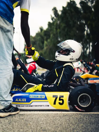 A handshake between a driver and a mechanic, symbolizing the trust and teamwork in our krew.