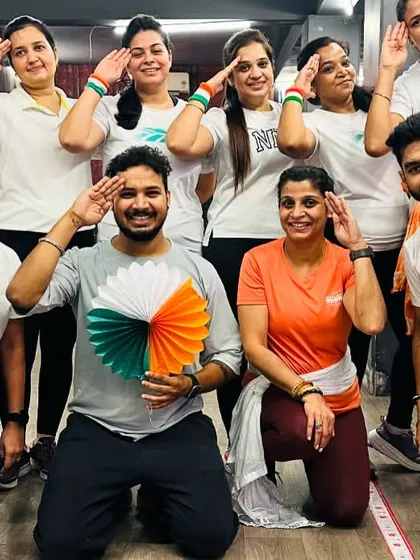 Saluting the nation with my incredible team. We combined our workout with a celebration of freedom.