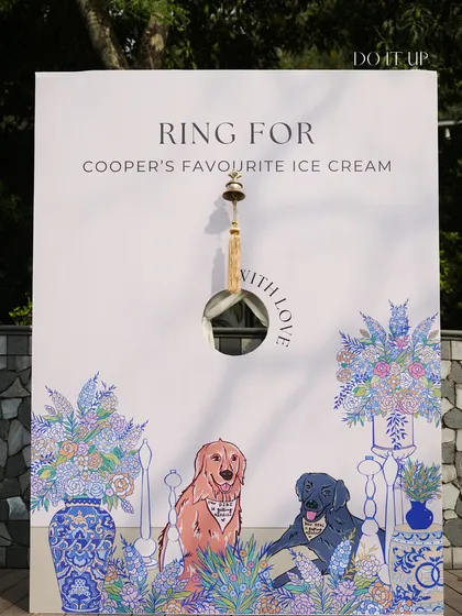 A fun and personal touch for the Mehndi guests. This custom sign, featuring illustrations of the couple's dogs, invites guests to "Ring for Cooper's favourite ice cream."