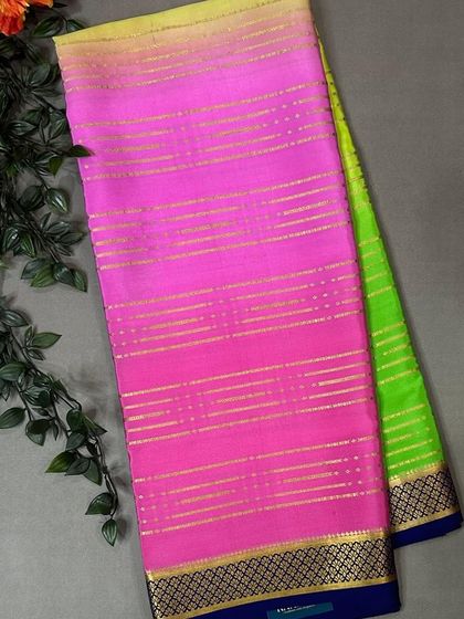 Another lovely Rangkat pure Mysore silk saree, this one blending shades of pink and neon green with a contrasting blue border.