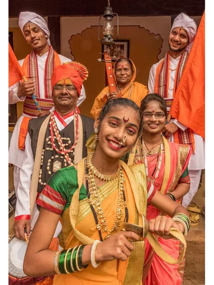 A vibrant street portrait of a family in traditional Maharashtrian attire. This image showcases my ability to capture cultural richness and celebratory moments with authenticity and energy.