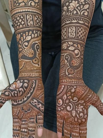 A purely pattern-based design, this showcases my skill with paisley and peacock motifs, creating a full and flowing look.