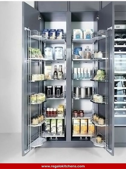 This double-door pantry system offers immense storage capacity. Each door has shelves for smaller items, while the main cabinet features pull-out racks, ensuring no item gets lost in the back.