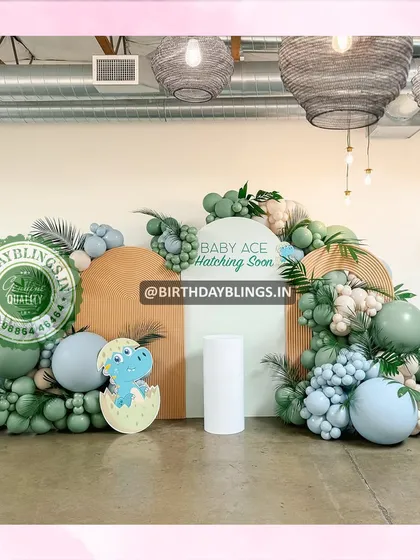 A full view of the dinosaur baby shower, showing the creative "hatching soon" concept.