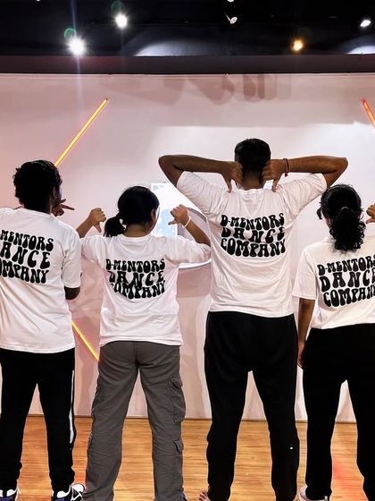 Representing the D-Mentors crew. Our students proudly wearing the company t-shirt at the showcase, a symbol of being part of our dance tribe.