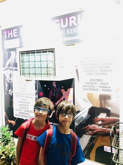 Brothers Vir and Viaan, our keyboard rockstars, standing outside our Chembur center. We are a musical oasis for students from all over the city.