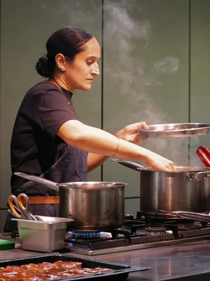 Chef Hanisha in her element, a glimpse into the focus and passion that goes into every plate at Plats.