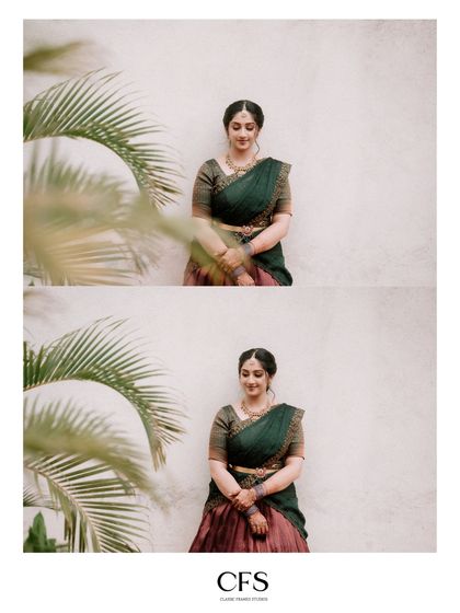 A serene portrait of the bride, Smruthi, framed by palm leaves. The natural elements add a soft and organic feel to this beautiful shot.