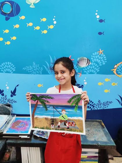A beautiful sunset beach scene with a twist. This young artist added a fishing pole to her landscape for our imaginative April Fool's Day session.