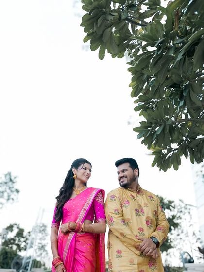 A low-angle shot of a couple during their pre-wedding shoot.
