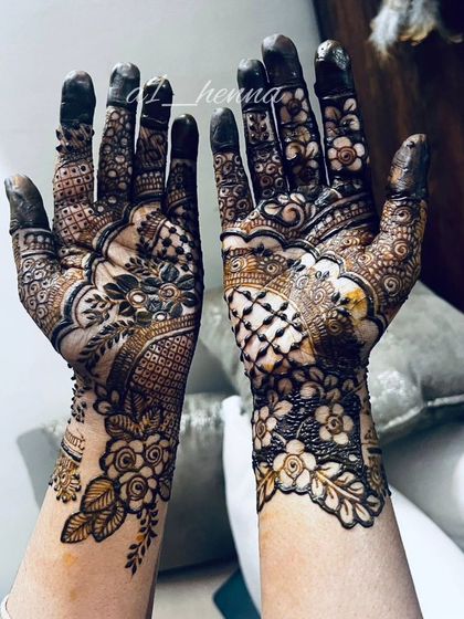 A dense and intricate design combining floral and geometric patterns.