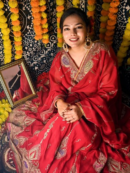 A client looking beautiful in a red heritage outfit, perfectly complemented by my 'मणिकर्णिका' (Manikarnika) earrings.