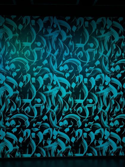 We have a variety of textured walls to add depth and mood to your shots. This particular wall, lit with a cool teal light, provides a sophisticated and modern background that works well for fashion and portrait work.