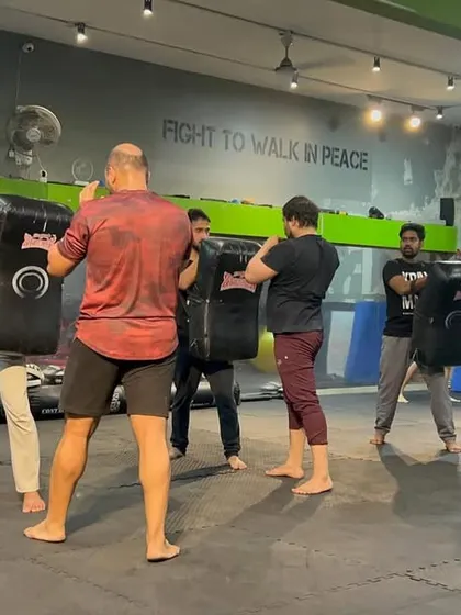 In my gym, you are your only competition. Students work in pairs on the kick shields, pushing each other to strike harder, move faster, and be better than they were yesterday.