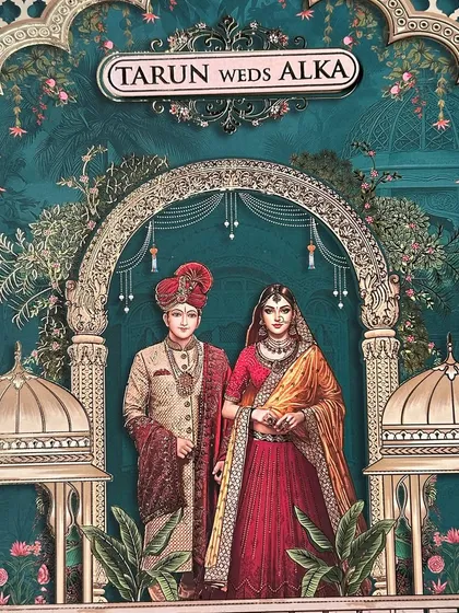 I love bringing stories to life with vibrant color. This invitation uses a striking teal and red palette to frame a regal couple, illustrated in the classic Indian miniature style. It’s a bold and beautiful announcement of your union.
