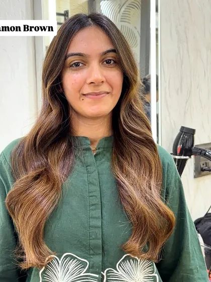 A happy bride to be showing off her new cinnamon brown hair. My goal is always to have you leave the salon feeling confident and in love with your new look, especially before a big event.