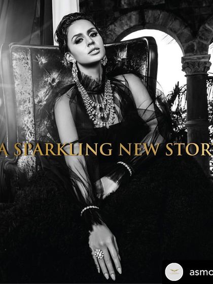 A dramatic black and white image for A S Motiwala's "Poetry of Polki" collection. This shot creates a mood of timeless elegance and high fashion.