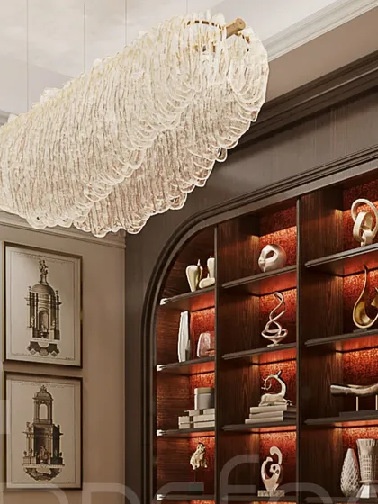 A close-up of the curated display shelf, where each object is carefully placed to create a sense of balance and artistry. The warm backlighting makes the collection glow.