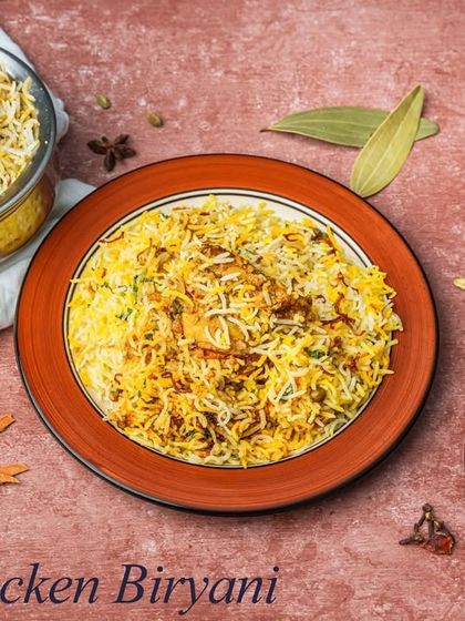 A timeless classic, our Chicken Biryani. Fragrant basmati rice is layered with spiced chicken and cooked on dum to seal in the flavours.