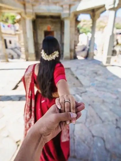 The classic "follow me to" shot, taken in the corridors of a historic fort, inviting you into their journey.